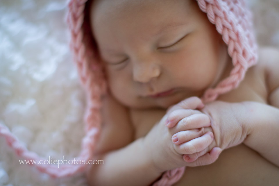 Newborn praying hands